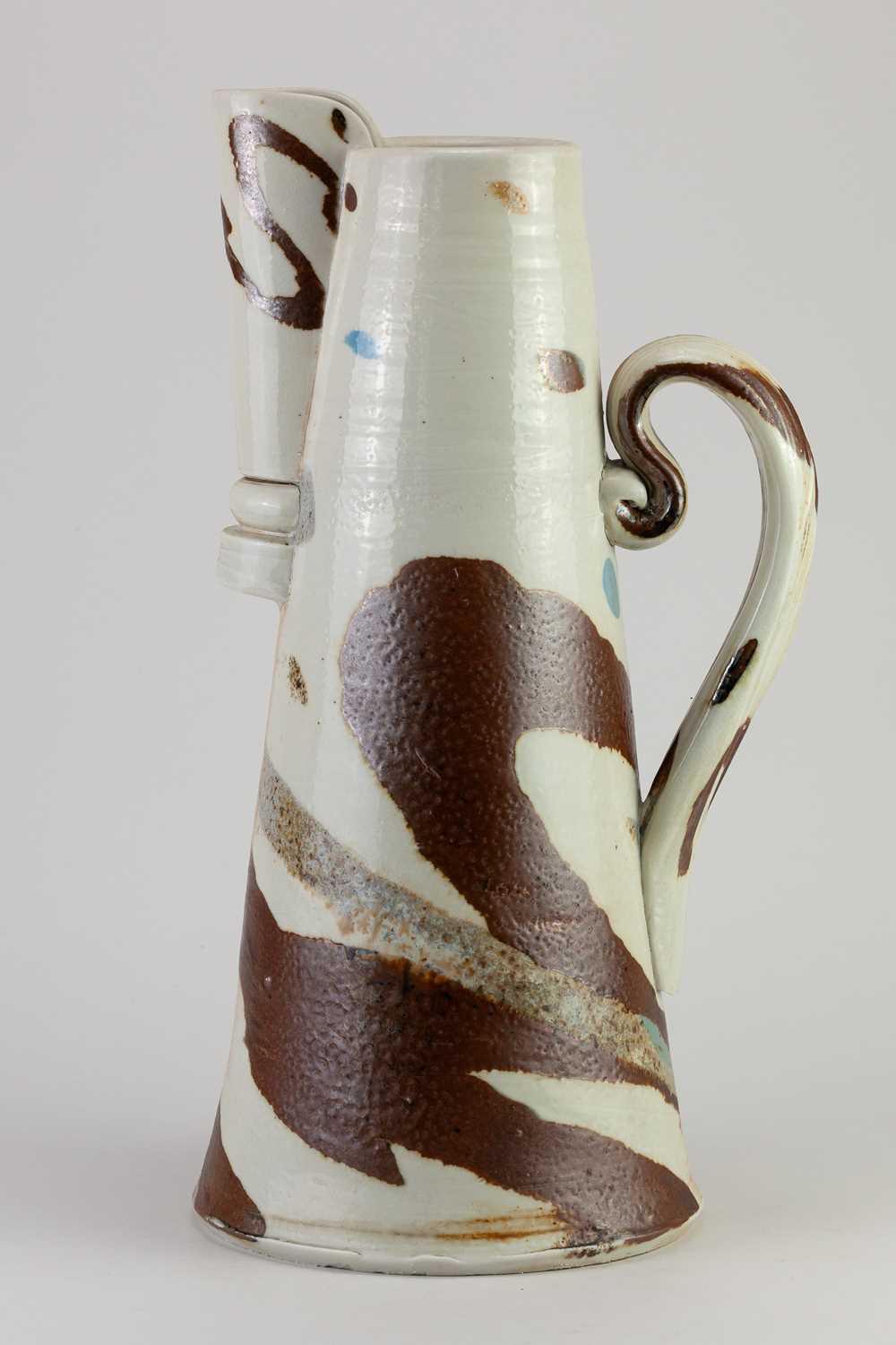 Lot 419 - JACK DOHERTY (born 1948); a tall porcelain jug...