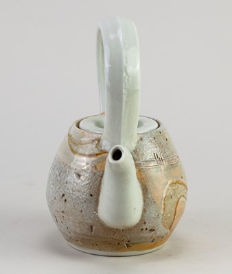 Lot 416 - JACK DOHERTY (born 1948); a porcelain teapot...