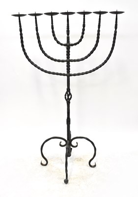 Lot 88 - A large wrought iron pricket candlestick with...