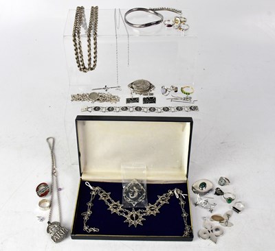 Lot 1239 - A group of silver and white metal jewellery...