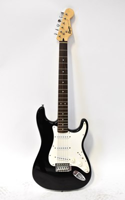 Lot 571 - FENDER; a Squier Bullet Strat electric guitar,...