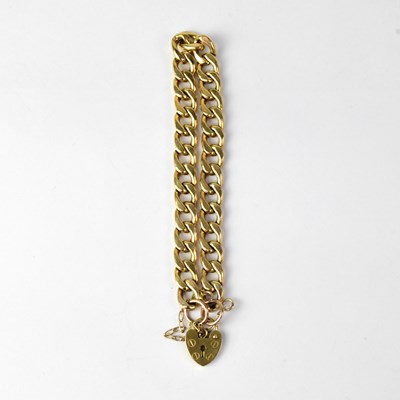 Lot 1038 - A 9ct yellow gold flat link bracelet with...