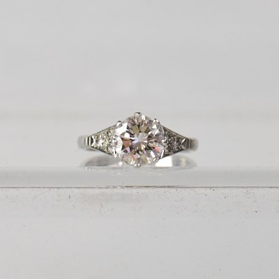 Lot 841 - A platinum and 18ct white gold diamond...