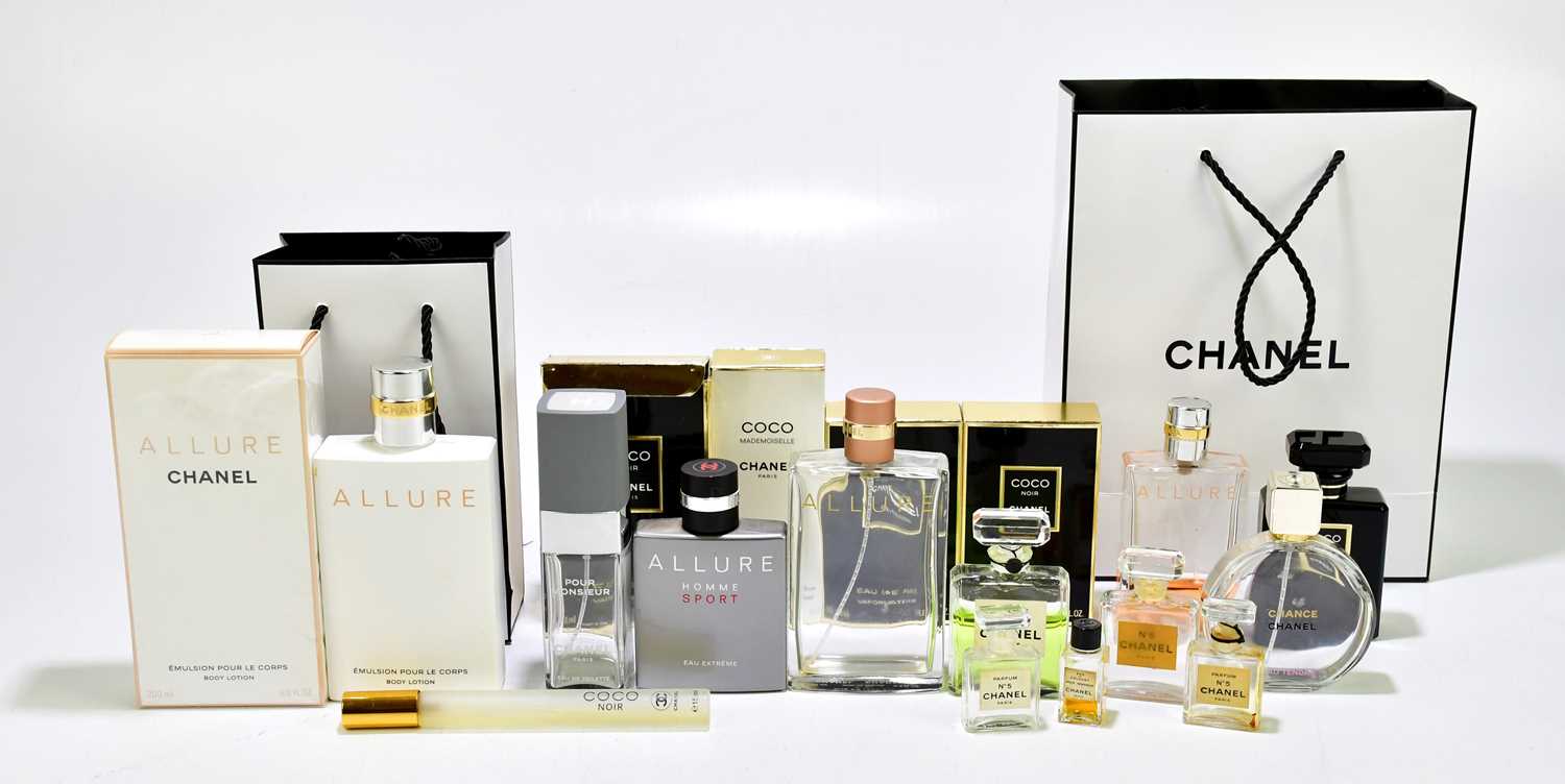 Lot 619 - CHANEL; fifteen perfume bottles including Coco,...