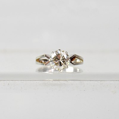 Lot 842 - An 18ct white gold diamond solitaire ring, the...