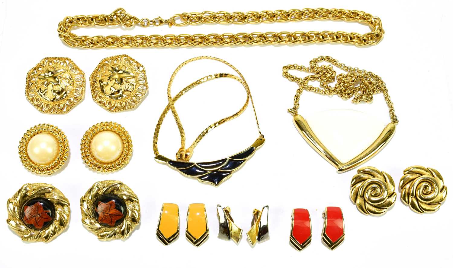 Lot 586 - MONET; three 1980s vintage gold chunky...