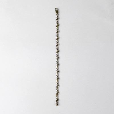 Lot 1026 - A 9ct white gold bracelet, length 18.5cm,...
