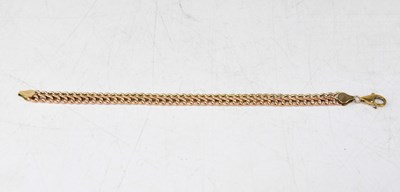 Lot 1028 - A 9ct rose gold and yellow gold bracelet,...