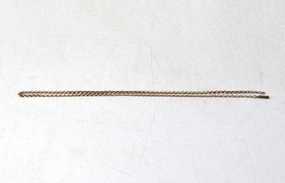 Lot 1153 - A 9ct rose gold chain with base metal clasp,...