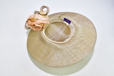 Lot 599 - PHILIP TREACY; a cream asymmetric wide brimmed...