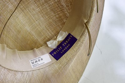 Lot 599 - PHILIP TREACY; a cream asymmetric wide brimmed...