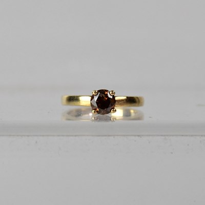 Lot 994 - A 9ct yellow gold fancy diamond solitaire ring,...