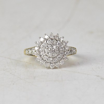 Lot 872 - A 9ct yellow gold and three-tiered diamond...