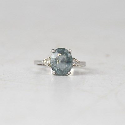 Lot 878 - An 18ct white gold pale blue Paraiba...