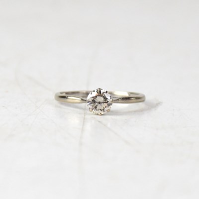 Lot 856 - An 18ct white gold diamond solitaire ring, the...