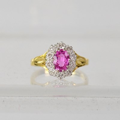 Lot 867 - An 18ct yellow gold pink sapphire and diamond...