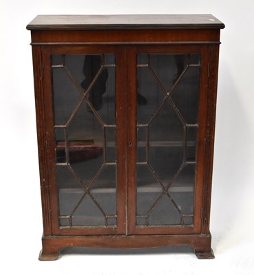 Lot 21 - A reproduction mahogany display cabinet of...