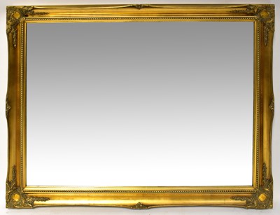 Lot 84 - A modern gilt framed wall mirror.