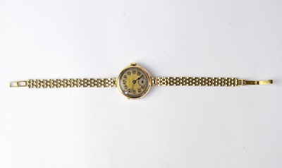 Lot 1294 - DOMINANT; a 9ct yellow gold ladies' vintage...