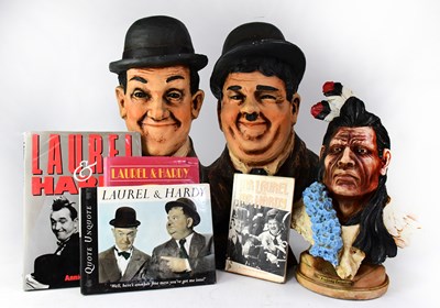 Lot 142 - A large Laurel and Hardy resin double bust, a...