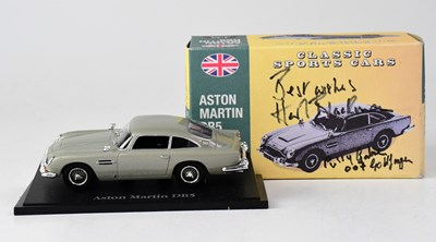 Lot 677 - A boxed model of an Aston Martin DB5, the box...