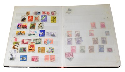 Lot 665 - A stamp album, containing mainly 1950s/60s...