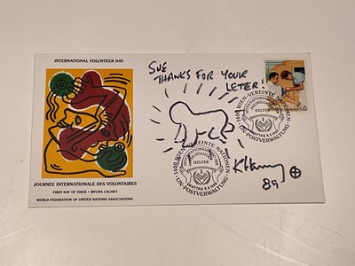 Lot 2076 - KEITH HARING; a first day cover signed by the...