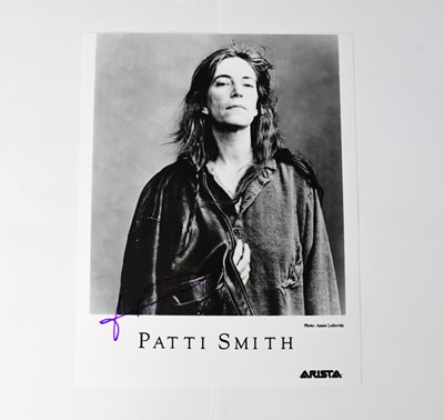 Lot 550 - PATTI SMITH; a black and white photograph...