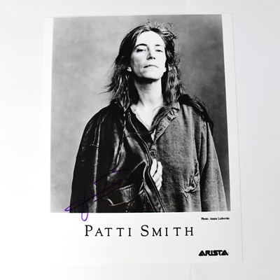 Lot 551 - PATTI SMITH; a black and white photograph...