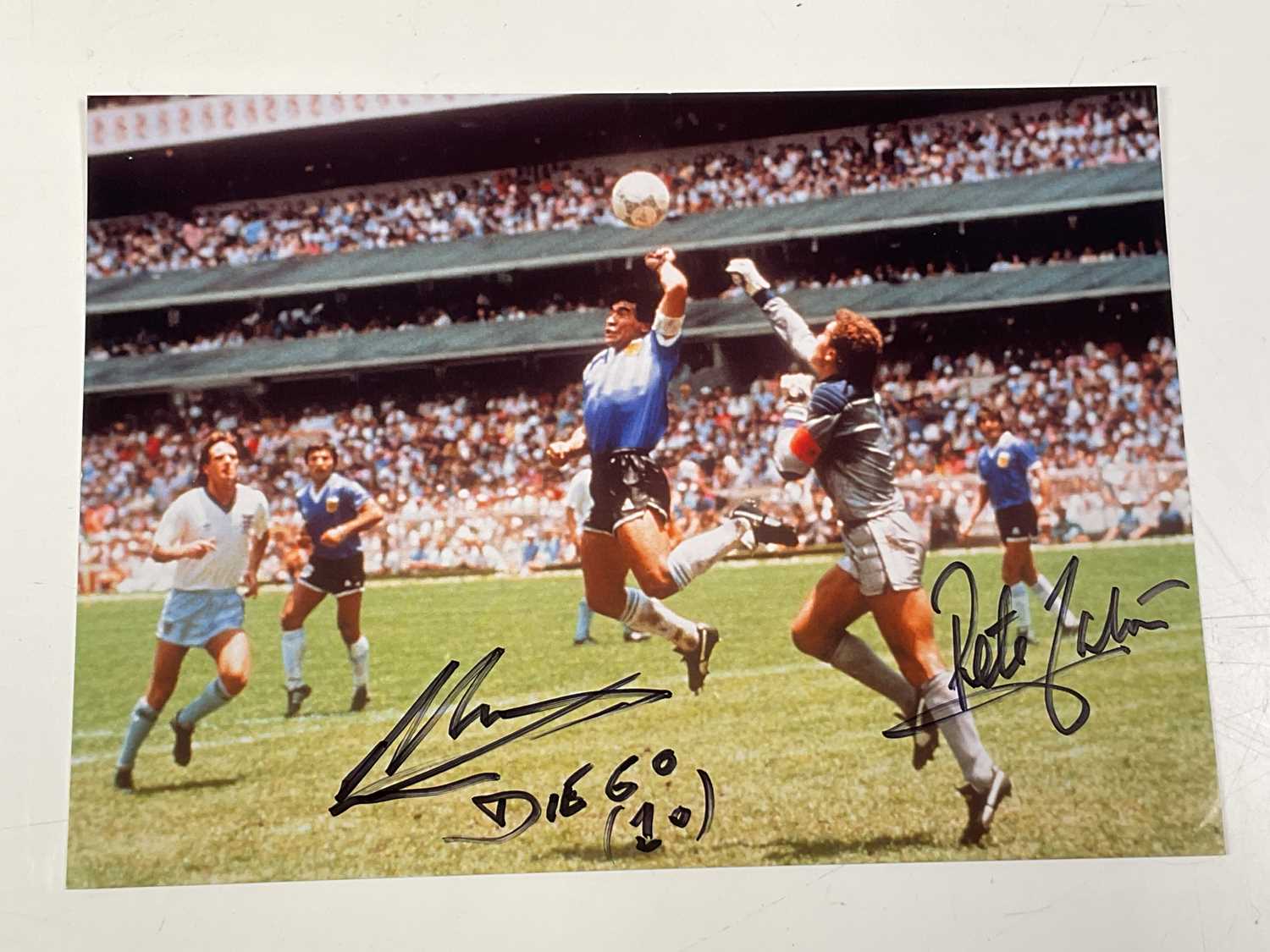 Lot 2347 - DIEGO MARADONA; a colour photograph showing...