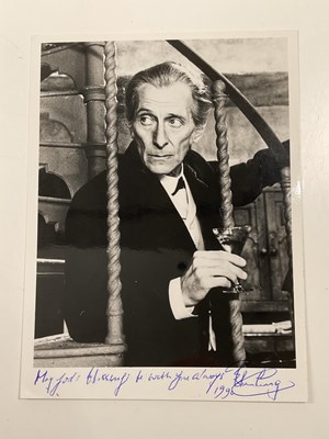 Lot 2151 - PETER CUSHING; a black and white photograph...