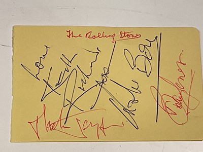 Lot 2043 - THE ROLLING STONES; a page from an autograph...