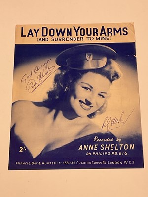 Lot 2046 - LAY DOWN YOUR ARMS; a music score bearing the...