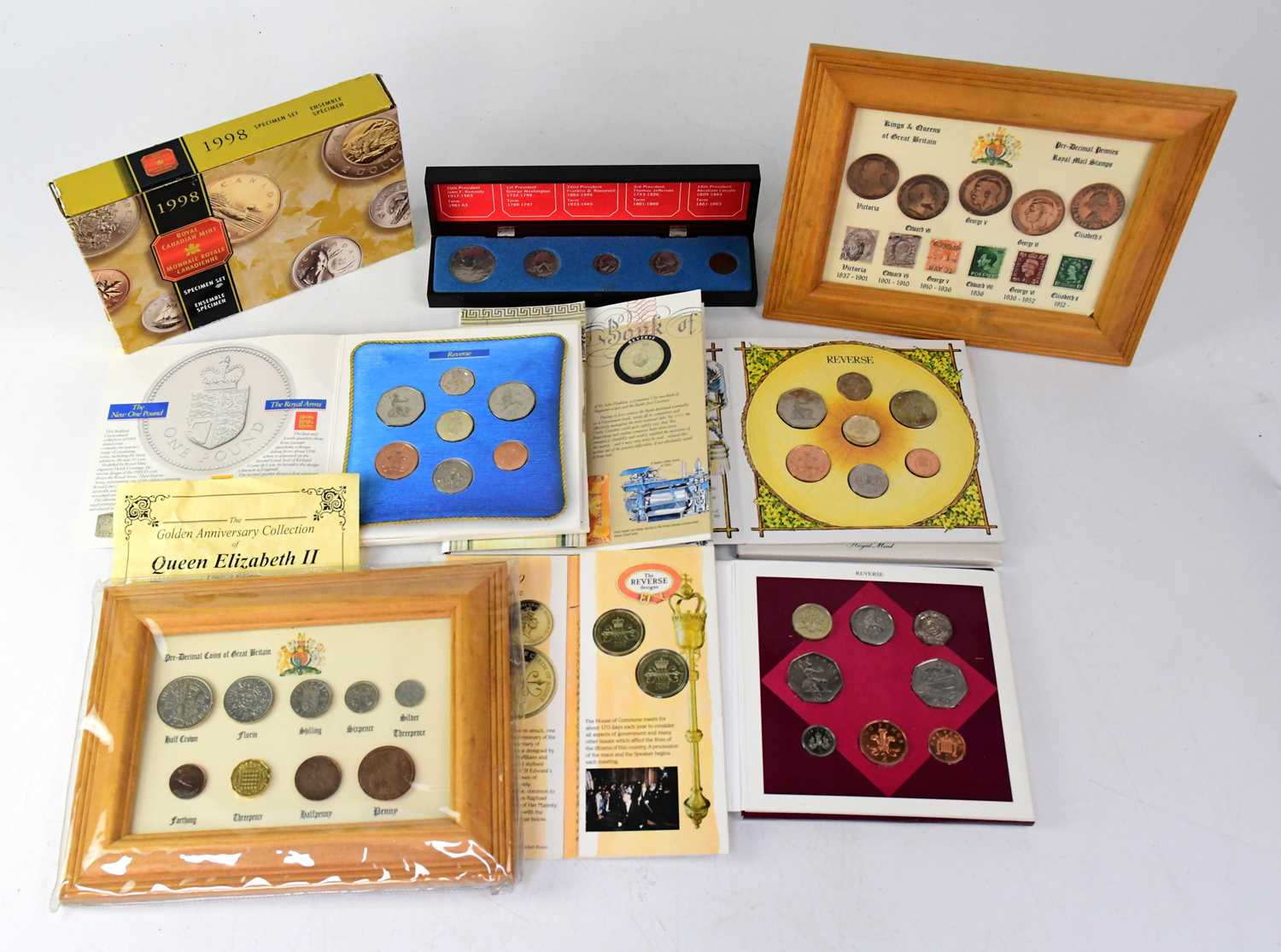 Lot 839 - A collection of commemorative coin sets and...