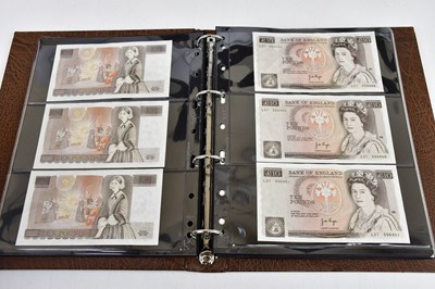 Lot 1030 - A collection of UK bank notes, ten shilling,...