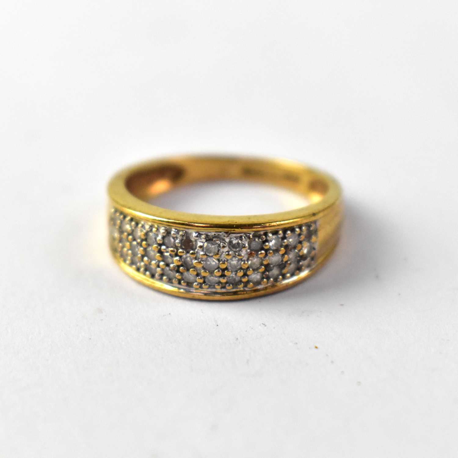 Lot 1031 - A 9ct gold diamond cluster ring