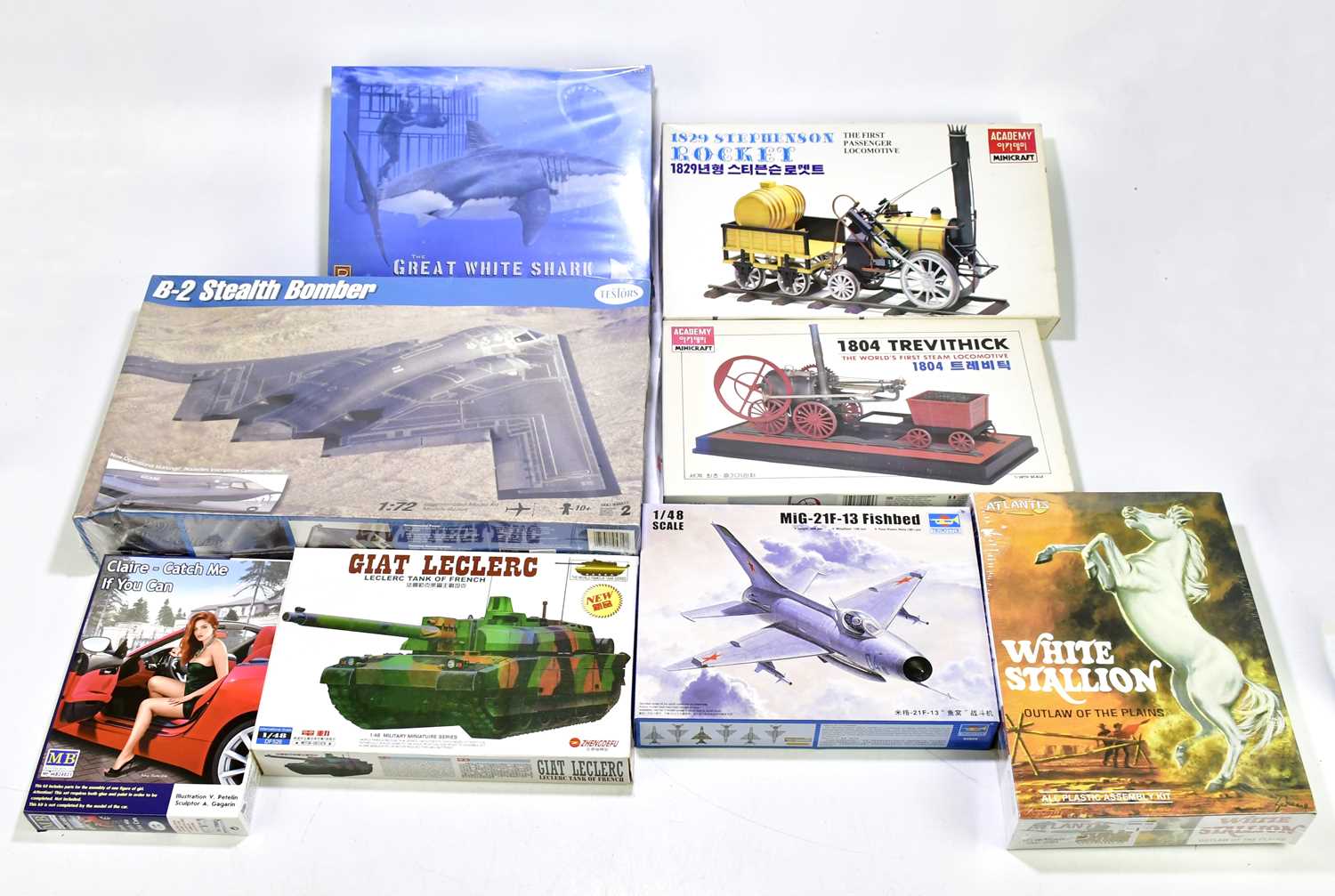 Lot 246 - A collection of eight boxed model kits to...