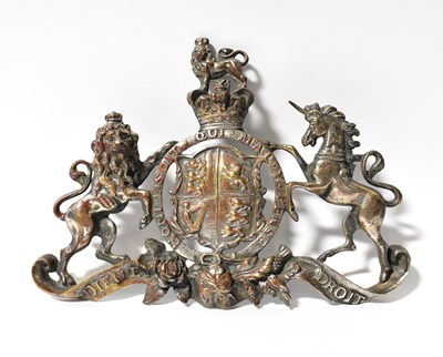 Lot 167 - A cast silvered metal royal coat of arms,...