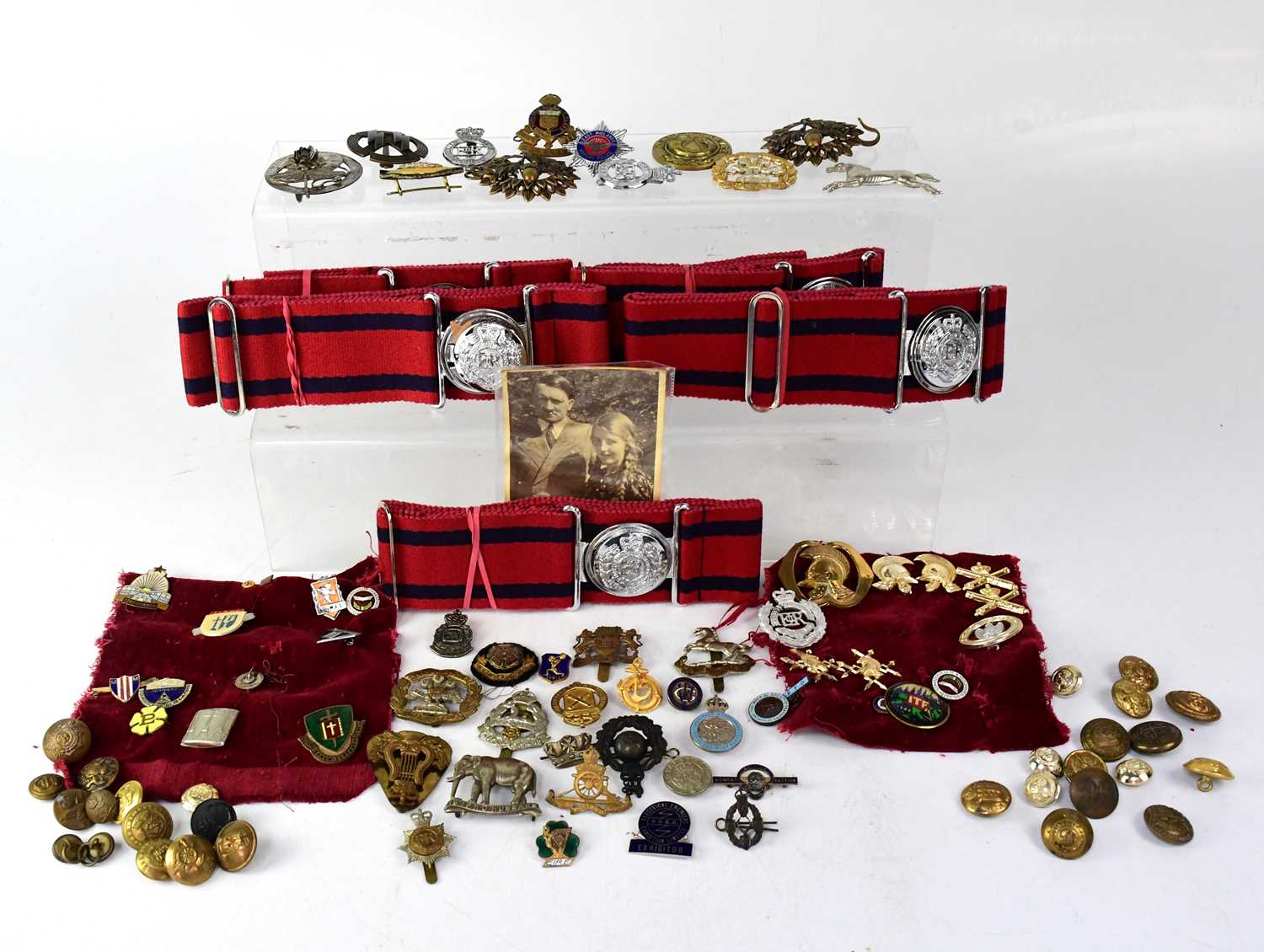 Lot 405 - A large collection of military cap badges,...