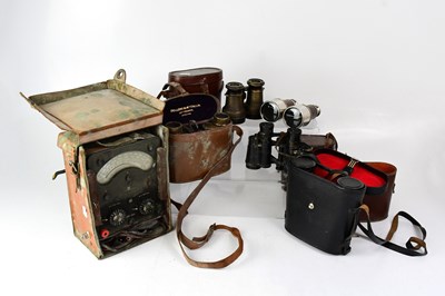 Lot 180 - A group of vintage binoculars and a voltmeter.