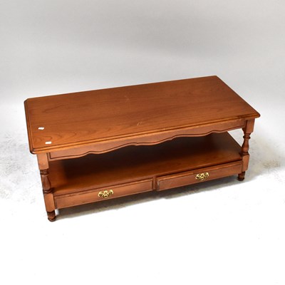 Lot 40 - A pine two-tier coffee table with pair of...