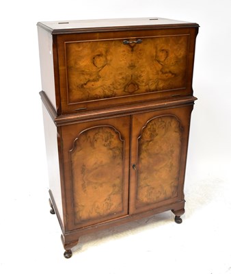 Lot 68 - A mid-20th century Epstein-style walnut...