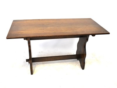 Lot 47 - A mid-20th century oak refectory-style dining...