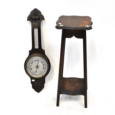 Lot 122 - A mid-20th century oak wall-hanging barometer...