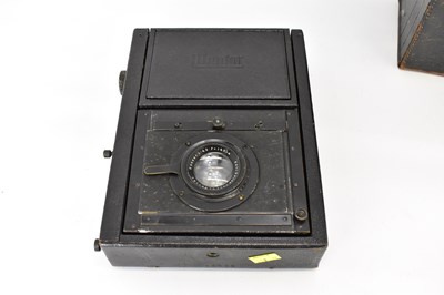 Lot 577 - A vintage folding Mentor half plate camera and...