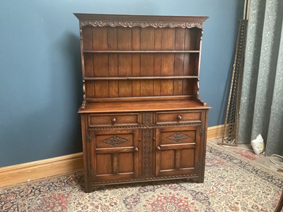 Lot 2589 - A reproduction oak dresser, with boarded plate...