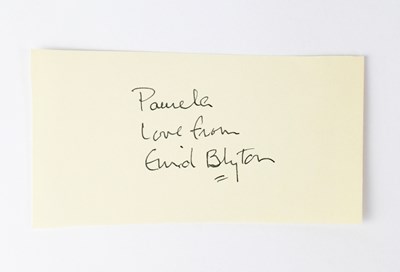 Lot 639 - ENID BLYTON; a cut piece of paper inscribed...