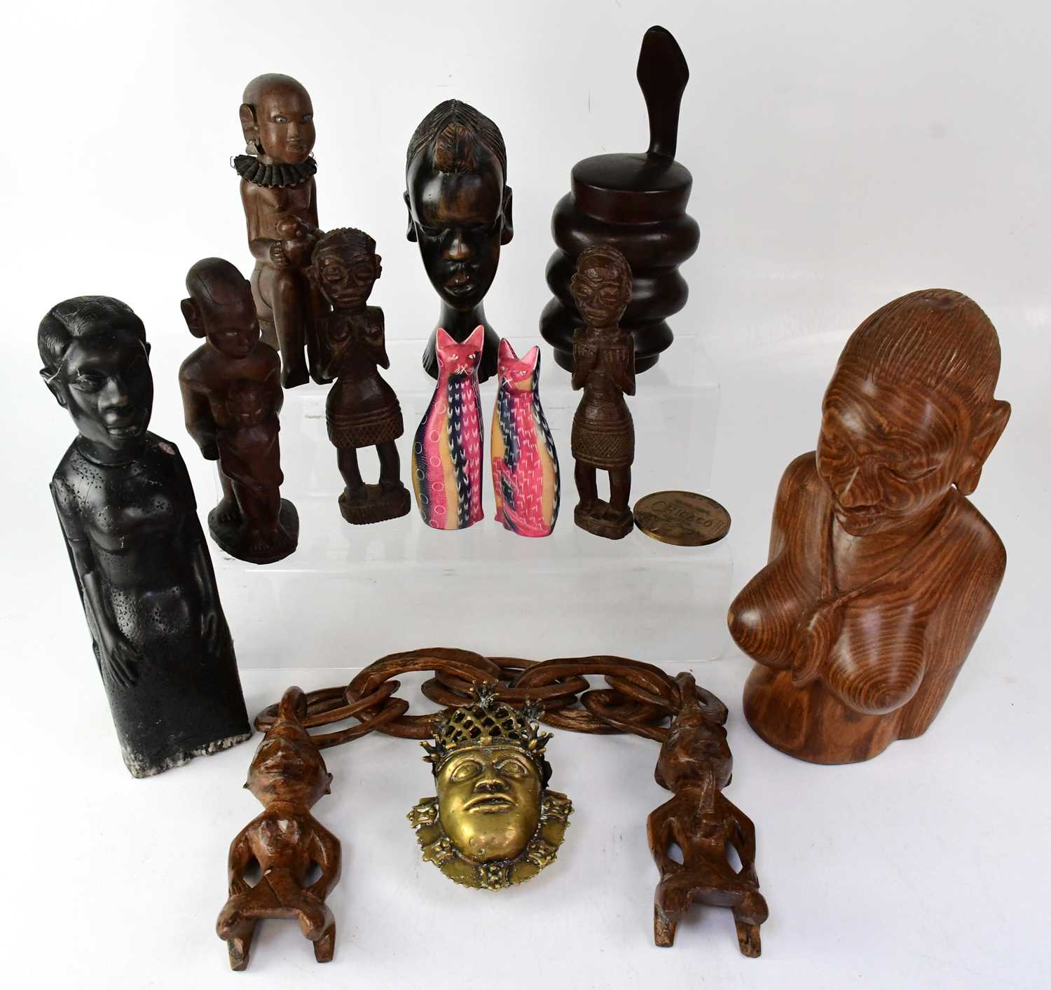 Lot 319 - A small group of contemporary African carvings,...