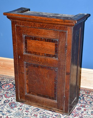 Lot 2524 - An 18th century oak hanging spice cabinet with...