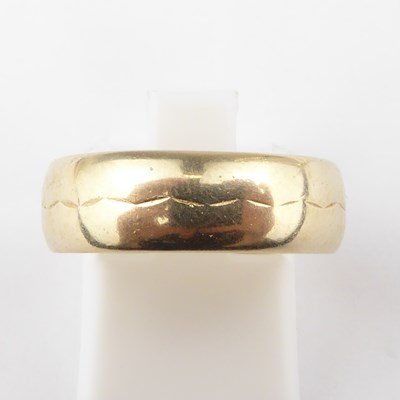 Lot 965 - A 9ct gold wedding band, size P, approx. 4.4g.